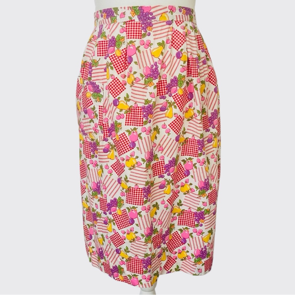 Vintage half apron featuring a fruit and gingham pattern with one pocket